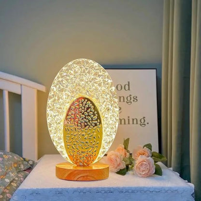 Decorative table lamp with floral design on a surface